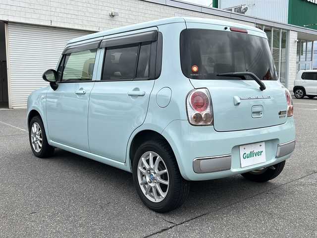 スズキ ラパン ショコラ G 新潟県 2014(平26)年 4.4万km アロマティックアクアメタリック ワンオーナー/純正ナビ/　(AM/FM/ワンセグ)/バックカメラ/ETC/アイドリングストップ/合皮レザー調シート/社外14インチアルミホイールスタッドレス/AUTOライト/HIDヘッドライト/スマートキー/プッシュスタート