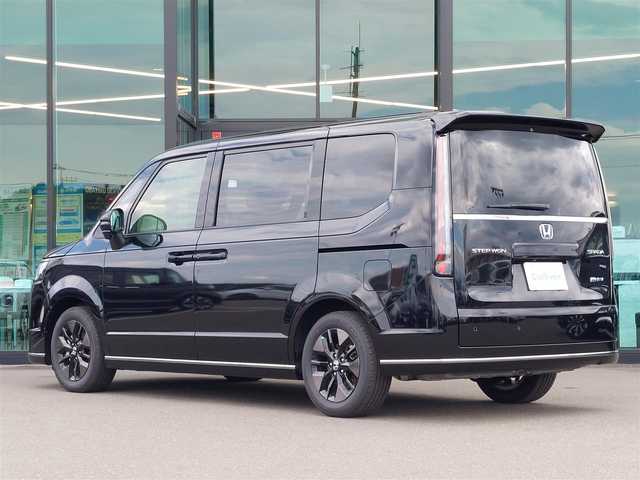 ホンダ ステップワゴン スパーダ eHEV 東京都 2024(令6)年 0.2万km クリスタルブラックパール 純正ナビ/バックカメラ/ETC/両側パワースライドドア/パワーバックドア/ハーフレザーシート/オットマン/シートヒーター/衝突軽減システム/レーンキープアシスト/ブラインドスポットモニター/コーナーセンサー/レーダークルーズコントロール/パドルシフト