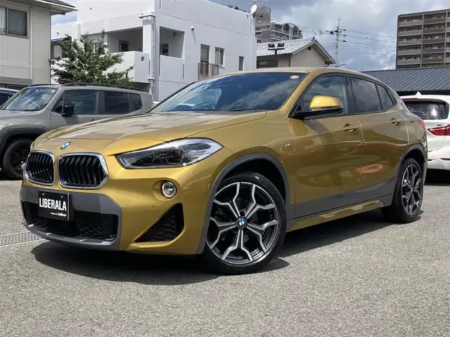 ＢＭＷ Ｘ２ xDrive 18d MスポーツX 熊本県 2019(平31)年 3.3万km ガルバニックゴールドメタリック ・スマートキー/・プッシュスタート/・インテリジェントセーフティ/・PDC自動起動/・パーキングアシスト/・クルーズコントロール(追従式)/・黒革シート/・前席シートヒーター /・前席パワーシート/・純正HDDナビ/　【Bluetooth・USB・AppleCarPlay】/・バックカメラ/・ETC/・パワーバックドア/・LEDヘッドランプ/・LEDフォグランプ/・純正マット