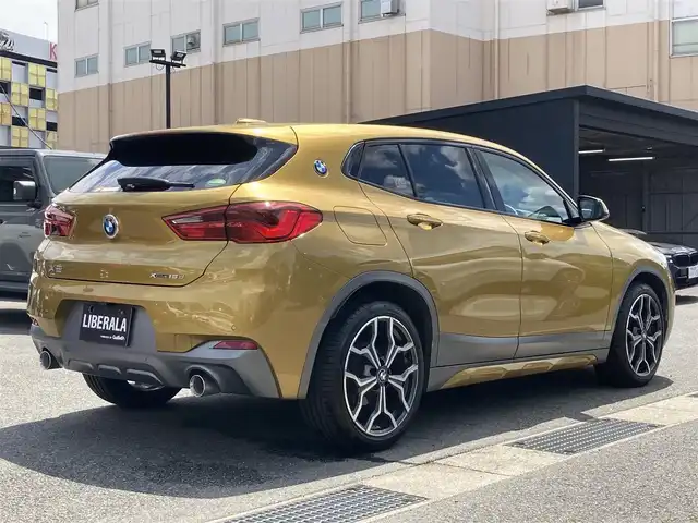 ＢＭＷ Ｘ２ xDrive 18d MスポーツX 熊本県 2019(平31)年 3.3万km ガルバニックゴールドメタリック ・スマートキー/・プッシュスタート/・インテリジェントセーフティ/・PDC自動起動/・パーキングアシスト/・クルーズコントロール(追従式)/・黒革シート/・前席シートヒーター /・前席パワーシート/・純正HDDナビ/　【Bluetooth・USB・AppleCarPlay】/・バックカメラ/・ETC/・パワーバックドア/・LEDヘッドランプ/・LEDフォグランプ/・純正マット