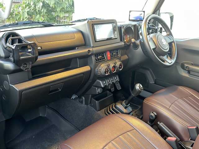 スズキ ジムニー XL 京都府 2022(令4)年 2.5万km ミディアムグレー 社外メモリナビ　Ｂｌｕｅｔｏｏｔｈオーディオ　フルセグ　ＤＶＤ再生　バックカメラ　リフトアップ　前席シートヒーター　リフトアップ　ビルトインＥＴＣ　スマートキー　プッシュスタート　フロアマット　禁煙車