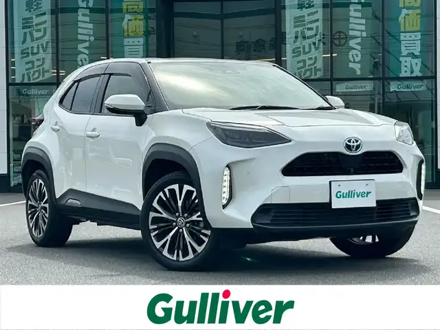 トヨタ ヤリスクロス ハイブリッド Z 岡山県 2021(令3)年 4.8万km ホワイトパールクリスタルシャイン 純正8インチディスプレイオーディオ/（AM.FM.BT.MiraCast）/全方位モニター/パワーバックドア/ハーフレザーシート/D/N席シートヒーター/D席パワーシート/トヨタセーフティセンス/・プリクラッシュセーフティ/・レーダークルーズコントロール/・レーンディパーチャアラート/・オートマチックハイビーム/ステアリングヒーター/電子パーキングシステム/ビルトインETC/USB入力端子/ブラインドスポットモニター/ドライブレコーダー