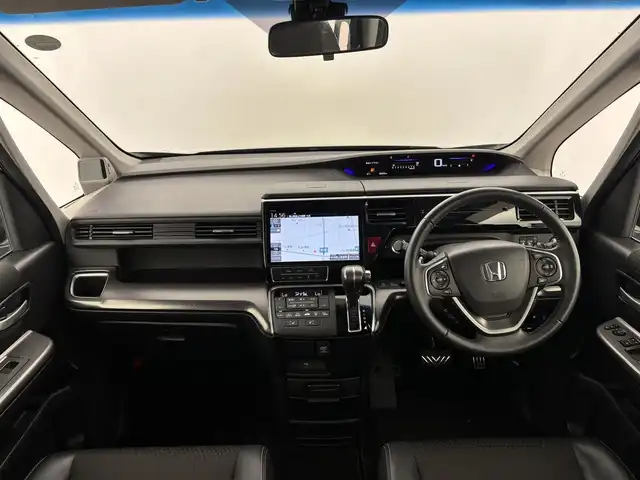 ホンダ ステップワゴン スパーダ クルスピセンシング 富山県 2020(令2)年 2.3万km プレミアムスパークルブラックパール 純正10型ナビ（AM/FM/DVD/BT/フルセグ）/バックカメラ/ETC/両側パワースライドドア/ハーフレザーシート/シートヒーター/衝突被害軽減システム/レーダークルーズコントロール/レーンキープアシスト/横滑り防止装置/アイドリングストップ/純正アルミホイール/純正フロアマット/オートLEDライト/革巻きステアリング/ステアリングスイッチ/パドルシフト/スマートキー/スペアキー