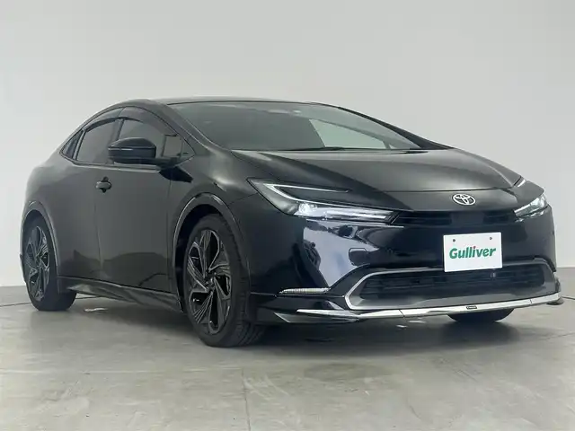トヨタ プリウス Z 愛知県 2023(令5)年 4万km アティチュードブラックマイカ ・純正ナビ/（フルセグTV/Bluetooth/Miracast）/・純正12.3型ディスプレイオーディオ/・禁煙車/・パノラマムーンルーフ/・アラウンドビューモニター/・デジタルインナーミラー/・アダクティブクルーズコントロール/・プリクラッシュセーフティー/・レーンディパーチャーアラート/・ブラインドスポットモニター/・パーキングアシスト/・レザーシート/・シートヒーター（D/N席）/・ベンチレーション（D/N席）/・ステアリングヒーター/・パワーバックドア/・LEDヘッドライト/・オートライト/・オートマチックハイビーム/・ビルトインETC2.0/・モデリスタ19インチアルミホイール/・純正フロアマット/・ワイヤレス充電/・スマートキー/・エンジンスタータ/・スペアキー1本