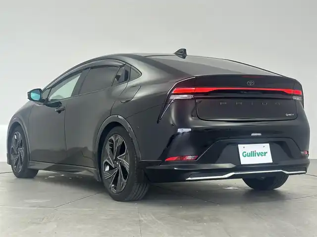 トヨタ プリウス Z 愛知県 2023(令5)年 4万km アティチュードブラックマイカ ・純正ナビ/（フルセグTV/Bluetooth/Miracast）/・純正12.3型ディスプレイオーディオ/・禁煙車/・パノラマムーンルーフ/・アラウンドビューモニター/・デジタルインナーミラー/・アダクティブクルーズコントロール/・プリクラッシュセーフティー/・レーンディパーチャーアラート/・ブラインドスポットモニター/・パーキングアシスト/・レザーシート/・シートヒーター（D/N席）/・ベンチレーション（D/N席）/・ステアリングヒーター/・パワーバックドア/・LEDヘッドライト/・オートライト/・オートマチックハイビーム/・ビルトインETC2.0/・モデリスタ19インチアルミホイール/・純正フロアマット/・ワイヤレス充電/・スマートキー/・エンジンスタータ/・スペアキー1本