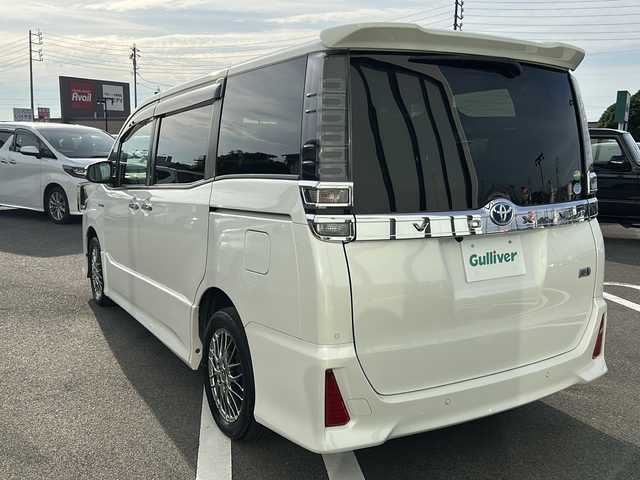 トヨタ ヴォクシー ハイブリッド ZS 煌Ⅱ 岐阜県 2019(平31)年 2.8万km ホワイトパールクリスタルシャイン 登録時走行距離27/258km/純正１０型SDナビ　/ドライブレコーダー　/ビルトインＥＴＣ　/バックカメラ　/クルーズコントロール　/両側パワースライド　/衝突軽減システム　/横滑り防止装置　/レーンキープアシスト　/前後コーナーセンサー　/ＬＥＤヘッドライト/オートライト/プッシュスタート/スマートキー/純正16インチアルミホイール/フロアマット