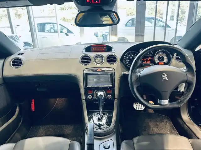 プジョー ＲＣＺ 大阪府 2014(平26)年 0.9万km 黒 社外ナビ/TV/バックカメラ/クリアランスソナー/純正18インチAW/HIDヘッドライト/クルコン/リモコンキー/電動リアスポイラー/黒革/パワーシート/Dシートメモリ/シートヒーター