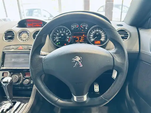 プジョー ＲＣＺ 大阪府 2014(平26)年 0.9万km 黒 社外ナビ/TV/バックカメラ/クリアランスソナー/純正18インチAW/HIDヘッドライト/クルコン/リモコンキー/電動リアスポイラー/黒革/パワーシート/Dシートメモリ/シートヒーター