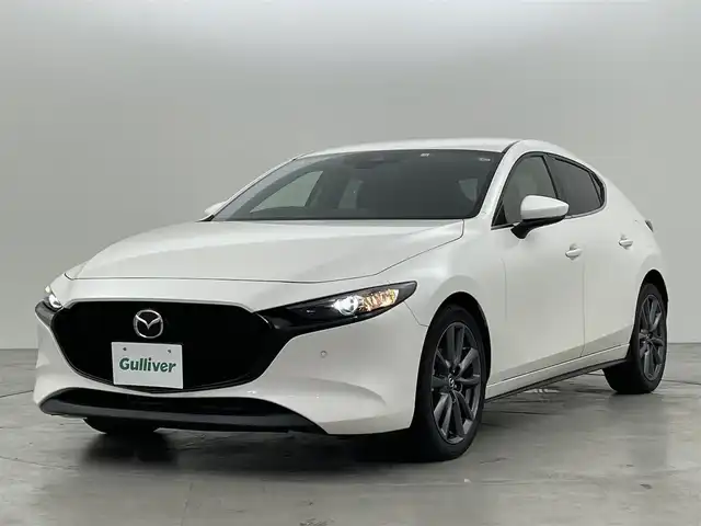 マツダ マツダ３ファストバック 15S ツーリング 福岡県 2020(令2)年 5.6万km スノーフレイクホワイトパールマイカ 純正ナビ（ＢＴ，フルセグＴＶ）　/バックカメラ　/ｉ－ＡＣＴＩＶＳＥＮＳＥ　/ＡＣＣ　/コーナーセンサー　/衝突軽減ブレーキ　/レーンキープ　/ＢＳＭ　/踏み間違い防止　/アイドリングストップ　/スタッドレスタイヤ積込み