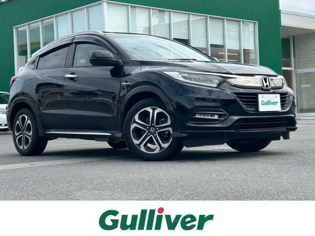 ホンダ ヴェゼル ハイブリッド Z ホンダセンシング 静岡県 2019(令1)年 7.6万km 黒 純正ナビ(CD/Bt/ワンセグ)/バックカメラ/ドライブレコーダー前後/ETC/パドルシフト/保証書/取扱説明書/記録簿/レーダークルーズコントロール/D席N席シートヒーター/ハーフレザーシート/フロアマット/純正アルミホイール/ABS/横滑り防止装置/レーンキープアシスト/オートライト/LEDヘッドライト/W+サイドエアバック/カーテンエアバック/衝突軽減システム/エンジンスタートボタン/パワーステアリング/パワーウィンドウ/スマートキー/アイドリングストップ/オートエアコン/ホンダセンシング