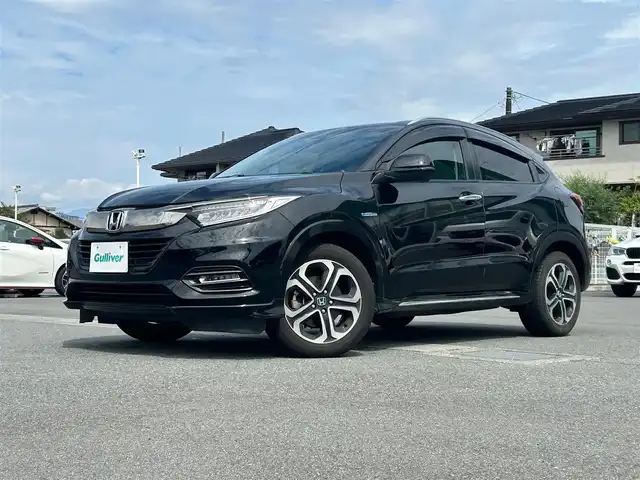 ホンダ ヴェゼル ハイブリッド Z ホンダセンシング 静岡県 2019(令1)年 7.6万km 黒 純正ナビ(CD/Bt/ワンセグ)/バックカメラ/ドライブレコーダー前後/ETC/パドルシフト/保証書/取扱説明書/記録簿/レーダークルーズコントロール/D席N席シートヒーター/ハーフレザーシート/フロアマット/純正アルミホイール/ABS/横滑り防止装置/レーンキープアシスト/オートライト/LEDヘッドライト/W+サイドエアバック/カーテンエアバック/衝突軽減システム/エンジンスタートボタン/パワーステアリング/パワーウィンドウ/スマートキー/アイドリングストップ/オートエアコン/ホンダセンシング