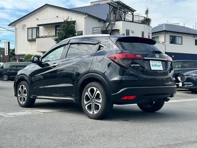 ホンダ ヴェゼル ハイブリッド Z ホンダセンシング 静岡県 2019(令1)年 7.6万km 黒 純正ナビ(CD/Bt/ワンセグ)/バックカメラ/ドライブレコーダー前後/ETC/パドルシフト/保証書/取扱説明書/記録簿/レーダークルーズコントロール/D席N席シートヒーター/ハーフレザーシート/フロアマット/純正アルミホイール/ABS/横滑り防止装置/レーンキープアシスト/オートライト/LEDヘッドライト/W+サイドエアバック/カーテンエアバック/衝突軽減システム/エンジンスタートボタン/パワーステアリング/パワーウィンドウ/スマートキー/アイドリングストップ/オートエアコン/ホンダセンシング