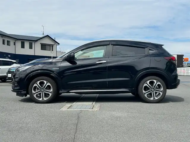 ホンダ ヴェゼル ハイブリッド Z ホンダセンシング 静岡県 2019(令1)年 7.6万km 黒 純正ナビ(CD/Bt/ワンセグ)/バックカメラ/ドライブレコーダー前後/ETC/パドルシフト/保証書/取扱説明書/記録簿/レーダークルーズコントロール/D席N席シートヒーター/ハーフレザーシート/フロアマット/純正アルミホイール/ABS/横滑り防止装置/レーンキープアシスト/オートライト/LEDヘッドライト/W+サイドエアバック/カーテンエアバック/衝突軽減システム/エンジンスタートボタン/パワーステアリング/パワーウィンドウ/スマートキー/アイドリングストップ/オートエアコン/ホンダセンシング