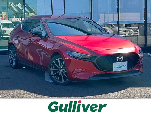 マツダ マツダ３ファストバック XD Lパッケージ 岐阜県 2022(令4)年 1.5万km ソウルレッドクリスタルM 登録時走行距離：15048km/純正ナビ/全方位カメラ/フルセグテレビ・Bluetooth・CD/iアクティブセンス/レーダークルーズコントロール/ブラインドスポットモニター/前後コーナーセンサー/ヘッドアップディスプレイ/レザーシート/シートヒーター/ドライブレコーダー/LEDヘッドライト/オートライト/オートマチックハイビーム/ステアリングヒーター/ETC/ポジショニングメモリー/アイドリングストップ/プッシュスタート/スマートキー/スペアキー