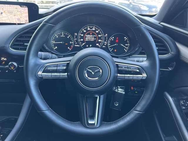 マツダ マツダ３ファストバック XD Lパッケージ 岐阜県 2022(令4)年 1.5万km ソウルレッドクリスタルM 登録時走行距離：15048km/純正ナビ/全方位カメラ/フルセグテレビ・Bluetooth・CD/iアクティブセンス/レーダークルーズコントロール/ブラインドスポットモニター/前後コーナーセンサー/ヘッドアップディスプレイ/レザーシート/シートヒーター/ドライブレコーダー/LEDヘッドライト/オートライト/オートマチックハイビーム/ステアリングヒーター/ETC/ポジショニングメモリー/アイドリングストップ/プッシュスタート/スマートキー/スペアキー