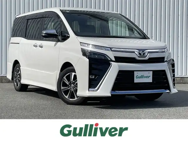 トヨタ ヴォクシー ZS 煌Ⅲ 福岡県 2020(令2)年 3.6万km ホワイトパールクリスタルシャイン 12.1インチフリップダウンモニター/トヨタセーフティセンス/PCS/LDA/PKSB/クリアランスソナー/純正９インチナビ（ＮＳＺＴ－Ｙ６８Ｔ）/フルセグTV/CD/DVD/BT/SD/AM/FM/バックカメラ/両側パワースライドドア/クルーズコントロール/ハーフレザー/スマートキー/プッシュスタート/LEDオートライト/オートハイビーム/ＥＴＣ