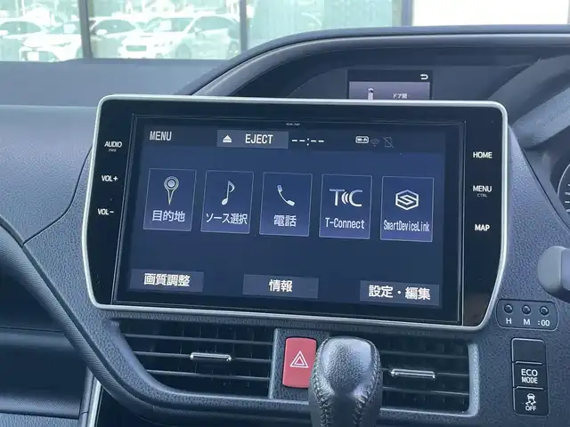 トヨタ ヴォクシー ZS 煌Ⅱ 香川県 2019(令1)年 7.4万km ホワイトパールクリスタルシャイン 純正10型SDナビゲーショ/→フルセグ/→CD/DVD/12.1型フリップダウンモニター/両側パワースライドドア/バックカメラ/クリアランスソナー/トヨタセーフティセンス/→プリクラッシュセーフティ/→レーンディパーチャーアラート/→レーントレーシングアシスト/→レーダークルーズコントロール/→オートマチックハイビーム/ビルトインETC/ドライブレコーダー（前後）/ステアリングスイッチ/三眼LEDヘッドライト/オートヘッドライト/電動格納ミラー（ウィンカー付）/パーソナルテーブル/後席サンシェード/スマートキー