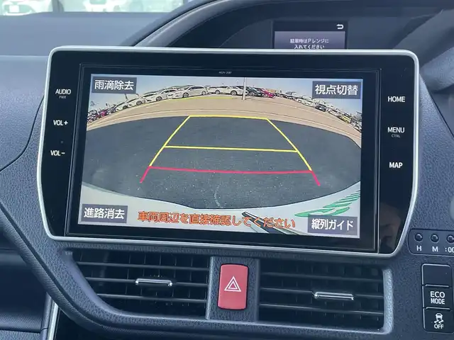 トヨタ ヴォクシー ZS 煌Ⅱ 香川県 2019(令1)年 7.4万km ホワイトパールクリスタルシャイン 純正10型SDナビゲーショ/→フルセグ/→CD/DVD/12.1型フリップダウンモニター/両側パワースライドドア/バックカメラ/クリアランスソナー/トヨタセーフティセンス/→プリクラッシュセーフティ/→レーンディパーチャーアラート/→レーントレーシングアシスト/→レーダークルーズコントロール/→オートマチックハイビーム/ビルトインETC/ドライブレコーダー（前後）/ステアリングスイッチ/三眼LEDヘッドライト/オートヘッドライト/電動格納ミラー（ウィンカー付）/パーソナルテーブル/後席サンシェード/スマートキー
