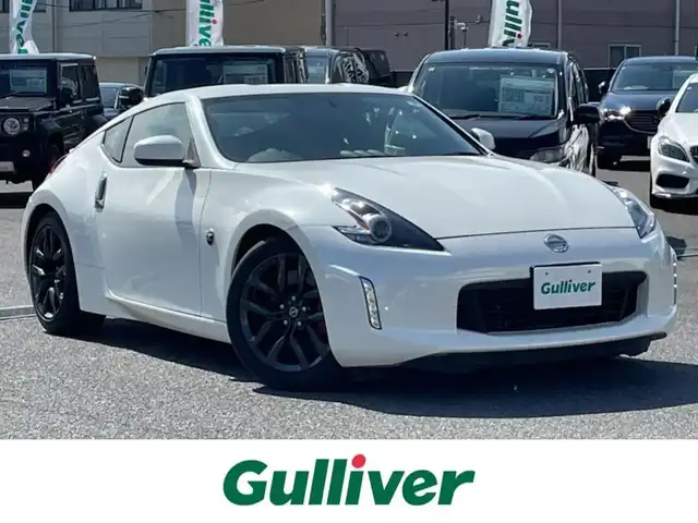 日産 フェアレディ Ｚ 広島県 2017(平29)年 1万km ブリリアントホワイトパール 登録時走行距離 9264km/ワンオーナー/レッドキャリパー/リアスポイラー/純正18インチブラックAW/ETC/HIDヘッドライト/オートライト/フォグランプ/純正フロアマット/プッシュスタート/スペアキー/オートエアコン/パドルシフト/保証書/取扱説明書