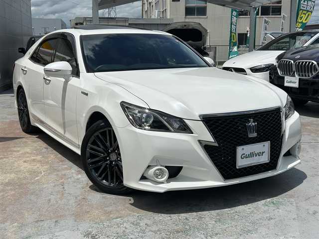 トヨタ クラウン ハイブリッド アスリートS ブラックスタイル 京都府 2015(平27)年 8.1万km ホワイトパールクリスタルシャイン  純正ナビ/　・フルセグTV/　・BTオーディオ/　・CD/DVD再生/　・AM/FM/　・バックカメラ/ サンルーフ/ レザーシート/ 前席パワーシート/ 前席シートヒーター/ 前席エアーシート/ ステアリングヒーター/ Bin ETC/ 前後ドライブレコーダー/ クルーズコントロール/ ステアリングリモコン/ 電動格納ミラー/ センターコンソール/ HIDヘッドライト/ フォグライト/ 純正18インチアルミホイール