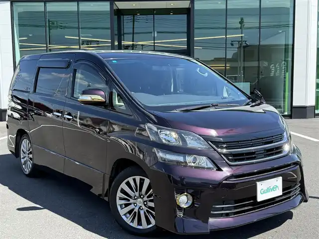 トヨタ ヴェルファイア 2．4Z ゴールデンアイズⅡ 栃木県 2014(平26)年 2.7万km ボルドーマイカメタリック 関東圏ワンオーナー車/MODELLISTAイルミネーショングリル/ALPINEナビ/フルセグTV/Bluetoothオーディオ/DVD再生機能/バックカメラ/ALPINEフリップダウンモニター/パワーバックドア/クルーズコントロール/両側パワースライドドア /ハーフレザーシート/純正18インチAW/スマートキー×2