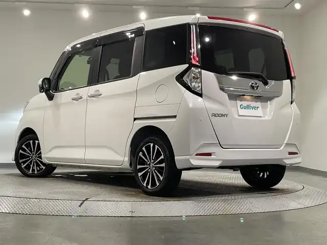 トヨタ ルーミー カスタムG－T 愛知県 2021(令3)年 2万km パールホワイトⅢ 純正９インチディスプレイオーディオ/パノラミックビューモニター/両側パワースライドドア/スマートアシストIII/衝突軽減ブレーキ/レーダークルーズコントロール/クリアランスソナー/車線逸脱警報/電動パーキングブレーキ/ブレーキホールド/シートヒーター/前後ドライブレコーダー/ビルトインＥＴＣ/USB入力端子/アクセサリーソケット/アイドリングストップ/純正15インチアルミホイール