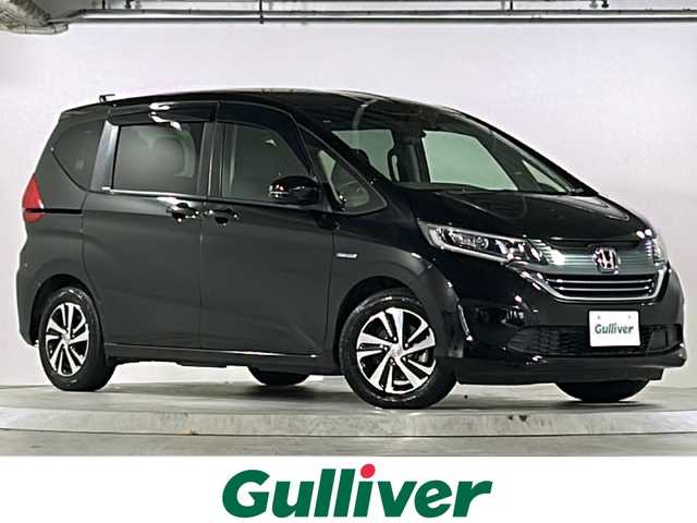ホンダ フリード ハイブリット EX 広島県 2019(平31)年 4.5万km プレミアムスパークルブラックパール 禁煙車/ワンオーナー/ホンダセンシング/・衝突軽減ブレーキ〈CMBS〉/・誤発進抑制機能/・ACC〈アダプティブ・クルーズ・コントロール〉/・LKAS〈車線維持支援システム〉/・行者事故低減ステアリング/・路外逸脱抑制機能/・先行車発進お知らせ機能/・標識認識機能/Cパッケージ/Sパッケージ/・本革巻ステアリングホイール/・コンビシート&専用インテリア/・15インチアルミホイール/・シートバックアッパーポケット/コンフォートビューパッケージ/純正ナビ(VXM-194VFi)/・フルセグTV/CD/DVD/Bluetooth/SD/バックカメラ/両側パワースライドドア/ステアリングスイッチ/オートライト/LEDヘッドライト＋アクティブコーナリングライト/ハーフレザー/シートヒーター/スマートキー/プッシュスタート/スペアキー/前、後ドライブレコーダー/ETC/純正ドアバイザー/W+サイド+カーテンエアバック