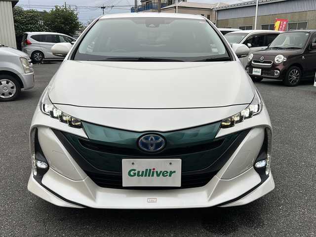 トヨタ プリウス ＰＨＶ S ナビパッケージ 埼玉県 2017(平29)年 5.9万km ホワイトパールクリスタルシャイン TRDエアロ/社外アルミホイール19インチ/プッシュスタート/メモリナビ/フルセグTV/バックカメラ/クルーズコントロール/レーンキープアシスト/ETC2.0/シートヒーター/ステアリングヒーター/本革巻きステアリング/Bluetooth有/オートライト/充電ケーブル有/衝突安全ボディー/盗難防止システム/ブレーキアシスト/運転席エアバッグ	/助手席エアバッグ	/サイドエアバッグ/AC100V　1500W