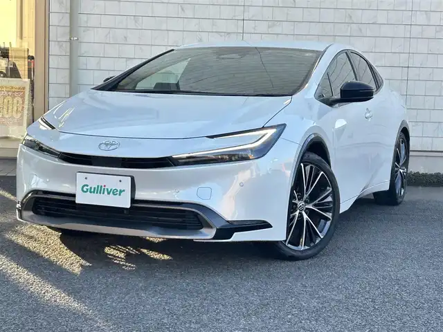 トヨタ プリウス Z 大分県 2023(令5)年 5.9万km プラチナホワイトパールマイカ 〇ワンオーナー/〇革シート/〇純正ディスプレイオーディオ（ナビ付）/　ラジオ・BT・USB/〇全方位カメラ/〇ETC/〇デジタルインナーミラー/〇ステアリングスイッチ/〇革巻きステアリング/〇ステアリングヒーター/〇オートハイビームアシスト/〇パワーバックドア/〇ヘッドライトレベライザー/〇置くだけ充電/〇シートヒーター/〇エアーシート/〇ACC/〇LKA/〇BSM/〇運転席パワーシート/〇AC100V/〇保証書/〇スペアキー