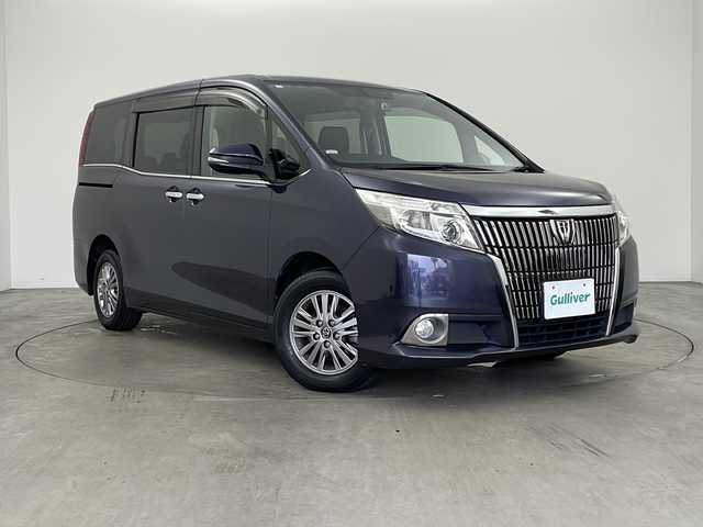 トヨタ エスクァイア Gi 兵庫県 2014(平26)年 4.8万km ダークバイオレットマイカメタリック ・純正ナビ/CD/DVD/BT/TV/・バックカメラ/・ビルトインETC/・ドライブレコーダー/・両側パワースライドドア/・クルーズコントロール/・合皮シート/・前席シートヒーター/・純正15インチアルミホイール/・リアロールサンシェード/・LEDライト/・フォグランプ/・ステアリングスイッチ/・防眩ミラー/・電動格納ミラー/・スマートキー/・スペアキー