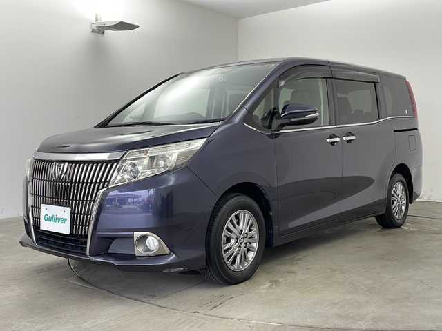 トヨタ エスクァイア Gi 兵庫県 2014(平26)年 4.8万km ダークバイオレットマイカメタリック ・純正ナビ/CD/DVD/BT/TV/・バックカメラ/・ビルトインETC/・ドライブレコーダー/・両側パワースライドドア/・クルーズコントロール/・合皮シート/・前席シートヒーター/・純正15インチアルミホイール/・リアロールサンシェード/・LEDライト/・フォグランプ/・ステアリングスイッチ/・防眩ミラー/・電動格納ミラー/・スマートキー/・スペアキー