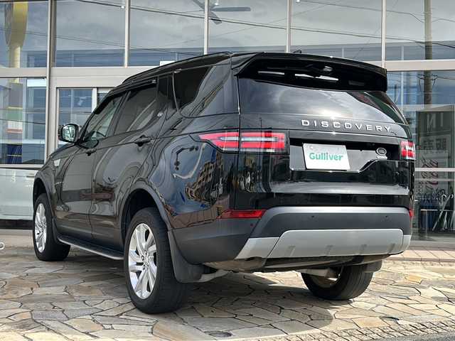 ランドローバー ランドローバー ディスカバリー HSE 静岡県 2018(平30)年 9万km 黒 純正ナビ/・Apple Car Play/・Android Auto/・Bluetooth/・USB/・HDMI/・フルセグTV/・CD/DVD/主要装備/・バックカメラ/・ドライブレコーダー/・白革/・前席パワーシート/・MERIDIANサウンド/・ダウンヒルアシスト/・走行モード切替/・パワーバックドア/・衝突回避/・レーンディパーチャーワーニング/・追従クルコン/・1列目+２列目左右独立温度調整オートエアコン