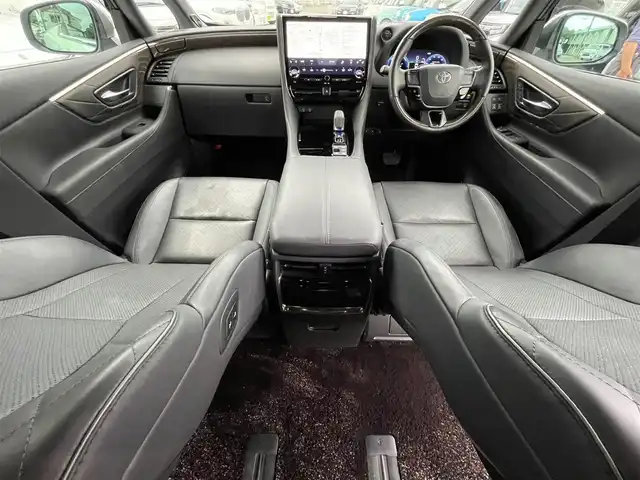 トヨタ アルファードハイブリット エグゼクティブ ラウンジ 愛知県 2023(令5)年 4.4万km プラチナホワイトパールマイカ モデリスタエアロ（F・S・R）/デジタルインナーミラー/ユニバーサルステップ/左右独立ムーンルーフ/純正ディスプレイオーディオナビ/（CD/DVD/FM/AM/BT/HDMI/AC100V）/フルセグTV（キャンセラー付き）/JBLサウンドシステム/リアエンターテイメントシステム/パノラミックビューモニター/ビルトイン2.0ETC/純正19インチAW/トヨタチームメイト/トヨタセーフティセンス/ブラインドスポットモニター/ヘッドアップディスプレイ/レーダークルーズコントロール/前後ドライブレコーダー/両側パワースライドドア/パワーバックドア/置くだけ充電/プロテクションフィルム/レインクリアリングブルーミラー/レザーシート/前席＋2列目パワーシート/前席＋2列目シートヒーター/エアシート/ハンドルヒーター/純正フロアマット/純正ドアバイザー/LEDヘッドライト/シーケンシャルウィンカー