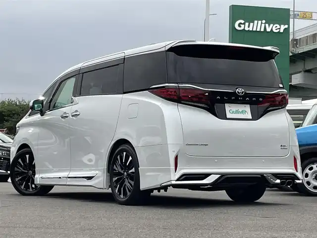 トヨタ アルファードハイブリット エグゼクティブ ラウンジ 愛知県 2023(令5)年 4.4万km プラチナホワイトパールマイカ モデリスタエアロ（F・S・R）/デジタルインナーミラー/ユニバーサルステップ/左右独立ムーンルーフ/純正ディスプレイオーディオナビ/（CD/DVD/FM/AM/BT/HDMI/AC100V）/フルセグTV（キャンセラー付き）/JBLサウンドシステム/リアエンターテイメントシステム/パノラミックビューモニター/ビルトイン2.0ETC/純正19インチAW/トヨタチームメイト/トヨタセーフティセンス/ブラインドスポットモニター/ヘッドアップディスプレイ/レーダークルーズコントロール/前後ドライブレコーダー/両側パワースライドドア/パワーバックドア/置くだけ充電/プロテクションフィルム/レインクリアリングブルーミラー/レザーシート/前席＋2列目パワーシート/前席＋2列目シートヒーター/エアシート/ハンドルヒーター/純正フロアマット/純正ドアバイザー/LEDヘッドライト/シーケンシャルウィンカー