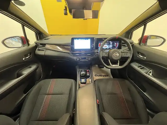 日産 オーラ ニスモ 群馬県 2022(令4)年 4.5万km ピュアホワイトパール / スーパーブラック 2トーン 安全性能/・プロパイロット/・エマージェンシーブレーキ/・ブラインドスポットモニター/・車線逸脱防止支援/・後退時車両検知/・駐車支援/純正9インチナビ/　　BT/フルセグ/    USB/HDMI/FM/AM/    AppleCarPlay/AndroidAuto/アラウンドビューモニター/デジタルインナーミラー/寒冷地仕様/前席シートヒーター/オートLEDヘッドライト/フォグランプ/リヤフォグランプ/置くだけ充電/電動パーキングブレーキ/オートブレーキホールド/スマートキー2本/純正17AW/純正フロアマット/前後ドライブレコーダー/ビルドインETC2.0