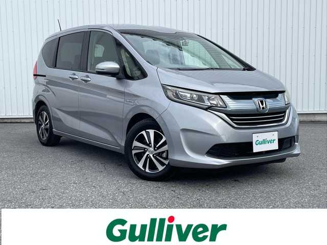 ホンダ フリード ハイブリット G ホンダセンシング 滋賀県 2018(平30)年 2.2万km ルナシルバーM ワンオーナー/ホンダセンシング/・先行車発進お知らせ/・標識認識機能/・レーンキープアシスト/・路外逸脱抑制機能/純正ナビ/・Bluetooth/・フルセグ/・CD/DVD/バックカメラ/純正フリップダウンモニター/ステアリングリモコン/前方ドライブレコーダー/ETC/両側パワースライドドア/アダプティブクルーズコントロール/LEDヘッドライト/シートリフター/電動格納ミラー/プッシュスタート/スマートキー