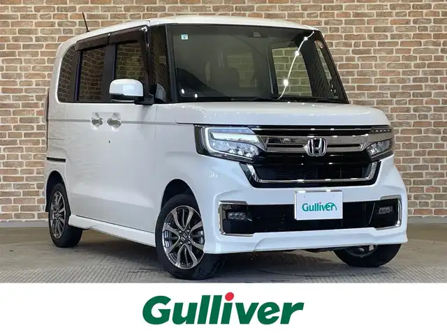 ホンダ Ｎ ＢＯＸ カスタム EX 岩手県 2021(令3)年 1.5万km プラチナホワイトパール ワンオーナー/４WD/両側パワースライドドア/ホンダセンシング/衝突軽減システム/踏み間違い衝突軽減システム/アダプティブクルーズコントロール/レーンアシスト/オートハイビーム/横滑り防止装置/コーナーセンサー/アイドリングストップ/シートヒーター/ロールサンシェード/チップアップリヤシート/シートバックテーブル/純正ナビ/（CD/DVD/フルセグ/USB/Bluetooth）/ステアリングスイッチ/バックカメラ/ETC/ドライブレコーダー/LEDヘッドライト/純正14インチアルミホイール