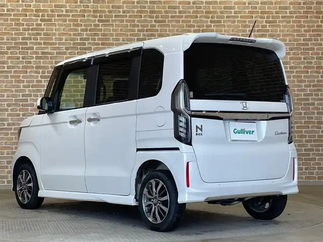 ホンダ Ｎ ＢＯＸ カスタム EX 岩手県 2021(令3)年 1.5万km プラチナホワイトパール ワンオーナー/４WD/両側パワースライドドア/ホンダセンシング/衝突軽減システム/踏み間違い衝突軽減システム/アダプティブクルーズコントロール/レーンアシスト/オートハイビーム/横滑り防止装置/コーナーセンサー/アイドリングストップ/シートヒーター/ロールサンシェード/チップアップリヤシート/シートバックテーブル/純正ナビ/（CD/DVD/フルセグ/USB/Bluetooth）/ステアリングスイッチ/バックカメラ/ETC/ドライブレコーダー/LEDヘッドライト/純正14インチアルミホイール