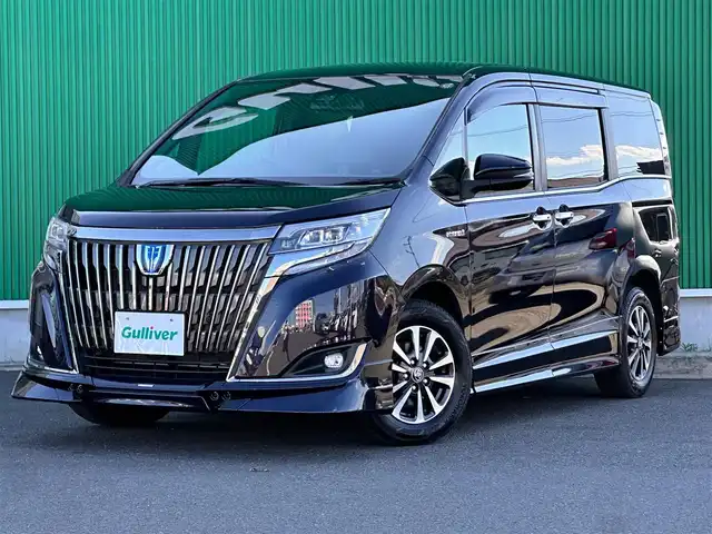 トヨタ エスクァイア ハイブリッド Gi プレミアムパッケージ ブラックテーラード 宮城県 2020(令2)年 7.2万km スパークリングブラックパールクリスタルシャイン TRDエアロ（F/S/R）/セーフティセンス/・プリクラッシュセーフティ/・レーンディパーチャーアラート/・オートマチックハイビーム/・先行車発進告知機能/パーキングサポートブレーキ/クリアランスソナー/純正10インチナビ（NSZN-Z68T）/・CD/DVD/・Bluetooth/・フルセグTV/バックカメラ/ビルトインETC2.0/ドライブレコーダー/両側パワースライドドア/ハーフレザーシート/シートヒーター/ステアリングヒーター/ウッドコンビステアリング/クルーズコントロール/ステアリングスイッチ/LEDヘッドランプ/フォグランプ/オートライト/スマートキー＆プッシュスタート/電動格納ミラー/純正15インチAW/純正フロアマット/純正ドアバイザー/Wエアバッグ
