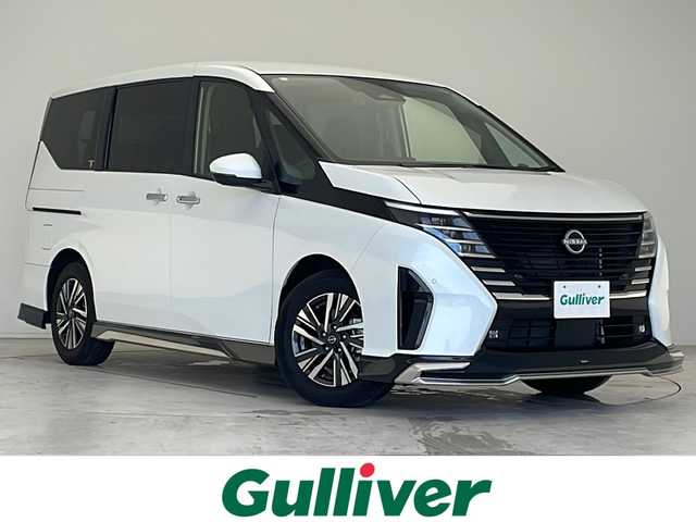 日産 セレナ ハイウェイスター V 愛知県 2023(令5)年 0.9万km プリズムホワイト プロパイロット/衝突被害軽減ブレーキ/純正12.4インチディスプレイオーディオ（ナビあり）/フリップダウンモニター/社外エアロパーツ/全方位カメラ/両側パワースライドドア/クルーズコントロール/フルセグTV/Bluetooth/バックカメラ/コーナーセンサー/純正アルミホイール/ETC2.0/ブラインドスポットモニター/LEDヘッドライト/パドルシフト/リアオートエアコン/オートマチックハイビーム/置くだけ充電器/ステアリングスイッチ/スマートキー/プッシュスタート