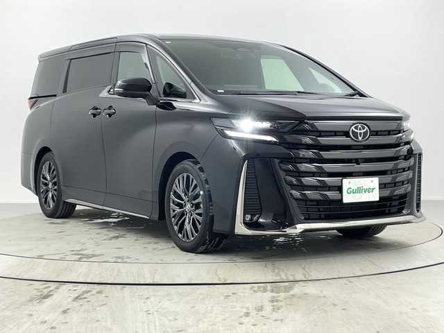 トヨタ ヴェルファイア ハイブリット Z プレミア 熊本県 2024(令6)年 0.9万km ブラック 純正１４型メモリナビ/（AM/FM/BT/ミラキャスト/HDMI/USB)/全方位カメラ/純正１３．２型有機ＥＬ後席モニター/ユニバーサルステップ/スペアキー1本/両側パワースライドドア/ガラスルーフ/電動リアゲート/パワーシート（前席＆セカンドシート）/シートヒーター＆ベンチレーション（前席＆セカンドシート）/ハンドルヒーター/純正アルミホイール/（225/55R19）/純正フロアマット/純正ビルトインETC2.0/トヨタチームメイト/トヨタセーフティセンス