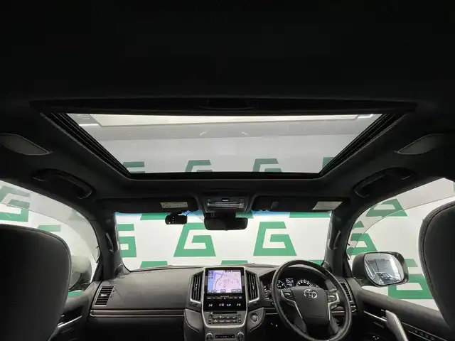 トヨタ ランドクルーザー ZX 鹿児島県 2021(令3)年 1.8万km アティチュードブラックマイカ モデリスタエアロ/純正T-Connect SDナビゲーション/フルセグTV/BT/CD/DVD/MSV/AM/FM/マルチテレインモニター/プレミアムサウンドシステム/リヤシートエンターテイメントシステム/サンルーフ/プレミアムナッパ本革シート/シートベンチレーション&シートヒーター/シートメモリ/レーダークルーズコントロール/パワーバックドア/純正20インチアルミホイール/純正LEDヘッドライト/純正フロアマット/純正ドアバイザー