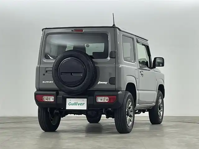 スズキ ジムニー XC 福島県 2022(令4)年 2.9万km ミディアムグレー スズキセーフティサポート/・誤発進抑制機能（前方・後方）/・後退時ブレーキサポート/・車線逸脱抑制機能/・ふらつき警報機能/・標識認識機能/・先行車発進お知らせ機能/・ハイビームアシスト/ダウンヒルアシスト/パートタイム４WD/純正8インチナビ/・型番：CN-RZ876/・フルセグ/CD/DVD/SD/USB/BT/FM/AM/・バックカメラ/・ETC/前後ドライブレコーダー/革巻きステアリング/・ステアリングスイッチ/前席シートヒーター/ＬＥＤヘッドライト/・フォグランプ/・オートライト/プッシュスタート/・スマートキー/電動格納ミラー/・ウィンカーミラー/・ミラーヒーター/純正フロアマット/純正ドアバイザー/純正16インチＡＷ