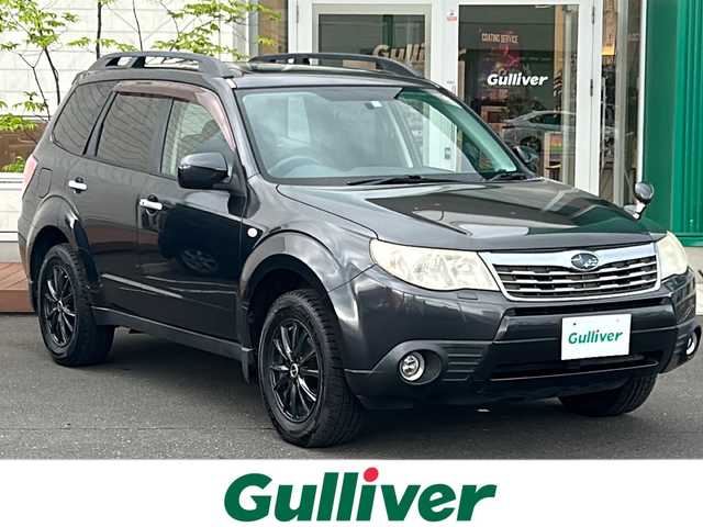 スバル フォレスター 2．0XS 青森県 2008(平20)年 19.6万km ダークグレーメタリック 4WD/社外HDDナビ/前席パワーシート・ヒーター/クルーズコントロール/スマートキー/プッシュスタート/HIDライト/フォグランプ/ルーフレール/社外16インチアルミ