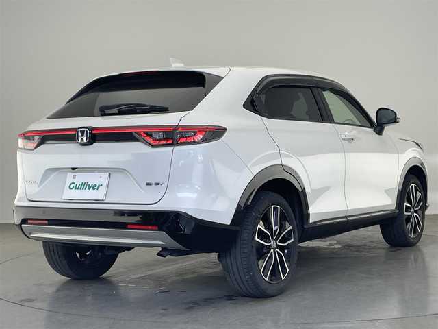ホンダ ヴェゼル ハイブリッド e:HEV Z 愛知県 2021(令3)年 4.6万km プラチナホワイトパール 純正９型ディスプレイナビ　フルセグＴＶ　カープレイ対応　バックカメラ　ワイヤレス充電　ＥＴＣ２．０　ＢＳＭ　電動パーキングブレーキ　シートヒーター　衝突軽減　追従クルコン　ハンドル支援　ＬＥＤ　禁煙