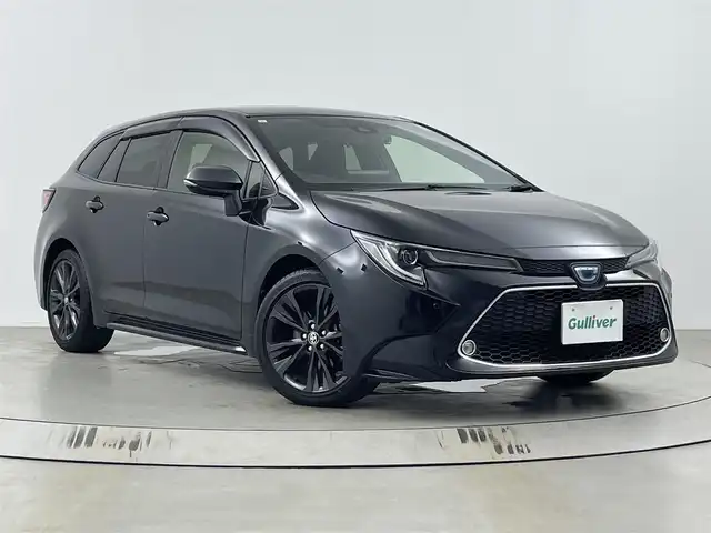 トヨタ カローラツーリング ハイブリッド ダブルバイビー 埼玉県 2021(令3)年 3万km ブラックマイカ 純正ナビ　/Bluetooth/フルセグTV/バックカメラ　/前後ドライブレコーダー　/ビルトインＥＴＣ　/シートヒーター　/ステアリングヒーター　/オートマティックハイビーム　/レーダークルーズコントロール　/衝突軽減システム　/ブレードホールド/電子パーキング/コーナーセンサー/レーンキープアシスト/純正17インチアルミホイール/LEDヘッドライト/純正フロアマット/ドアバイザー/スマートキー