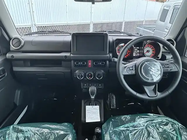 スズキ ジムニー ノマド FC 香川県 2025(令7)年 0.1千km アークティックホワイトパール スズキセーフティーサポート/・衝突被害軽減ブレーキ/・誤発進抑制機能/・車線逸脱警報/・アダプティブクルーズコントロール/・先行車発進お知らせ機能/シートヒーター/ヒーテッドドアミラー/コーナーセンサー/革巻きステアリング/ステアリングリモコン/純正アルミホイール15インチ/アイドリングストップ/パワーウィンドウ/オートエアコン/ETC/スマートキー/プッシュスタート