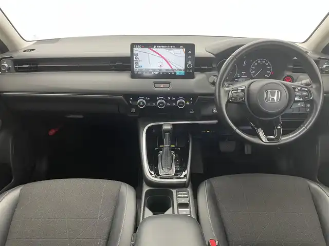 ホンダ ヴェゼル ハイブリッド e:HEV Z 愛知県 2021(令3)年 4万km パール 純正９型ディスプレイナビ　フルセグＴＶ　カープレ対応　バックカメラ　ワイヤレス充電　ＥＴＣ２．０　ＢＳＭ　電動パーキングブレーキ　ホンダセンシング　衝突軽減装置　追従クルコン　ハンドル支援　禁煙車/Honda SENSING/ブラインドスポットインフォメーション/ 後退出庫サポート/ Honda CONNECTディスプレー＋ETC2.0車載器＋ワイヤレス充電器/親水/ヒーテッドドアミラー＋熱線入りフロントウインドウ＋運転席助手席シートヒーター/ハンズフリーアクセスパワーテールゲート(予約クローズ機能付)/LEDシーケンシャルターンシグナルランプ/コンビシート/18インチアルミホイール