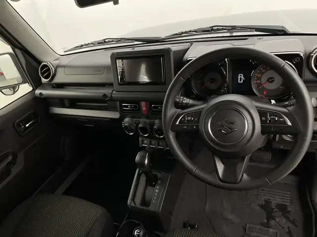 スズキ ジムニー シエラ JC 新潟県 2024(令6)年 0.8万km ミディアムグレー 4WD/デュアルセンサーブレーキサポート/サイドステップ/純正ディスプレイオーディオ/　CD/DVD/Bluetooth/バックカメラ/クルーズコントロール/LEDオートライト/シートヒーター/純正15インチアルミホイール/前後ドラレコ/電格ミラー/ウィンカーミラー/レーンキープアシスト/サイドスカート/スマートキー/ビルトインETC