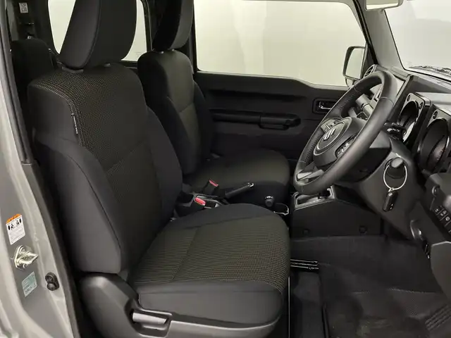 スズキ ジムニー シエラ JC 新潟県 2024(令6)年 0.8万km ミディアムグレー 4WD/デュアルセンサーブレーキサポート/サイドステップ/純正ディスプレイオーディオ/　CD/DVD/Bluetooth/バックカメラ/クルーズコントロール/LEDオートライト/シートヒーター/純正15インチアルミホイール/前後ドラレコ/電格ミラー/ウィンカーミラー/レーンキープアシスト/サイドスカート/スマートキー/ビルトインETC